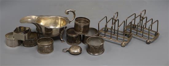 Silver sauceboat, toastracks, etc, napkin rings